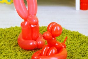 Rabbit balloon sculpting in red